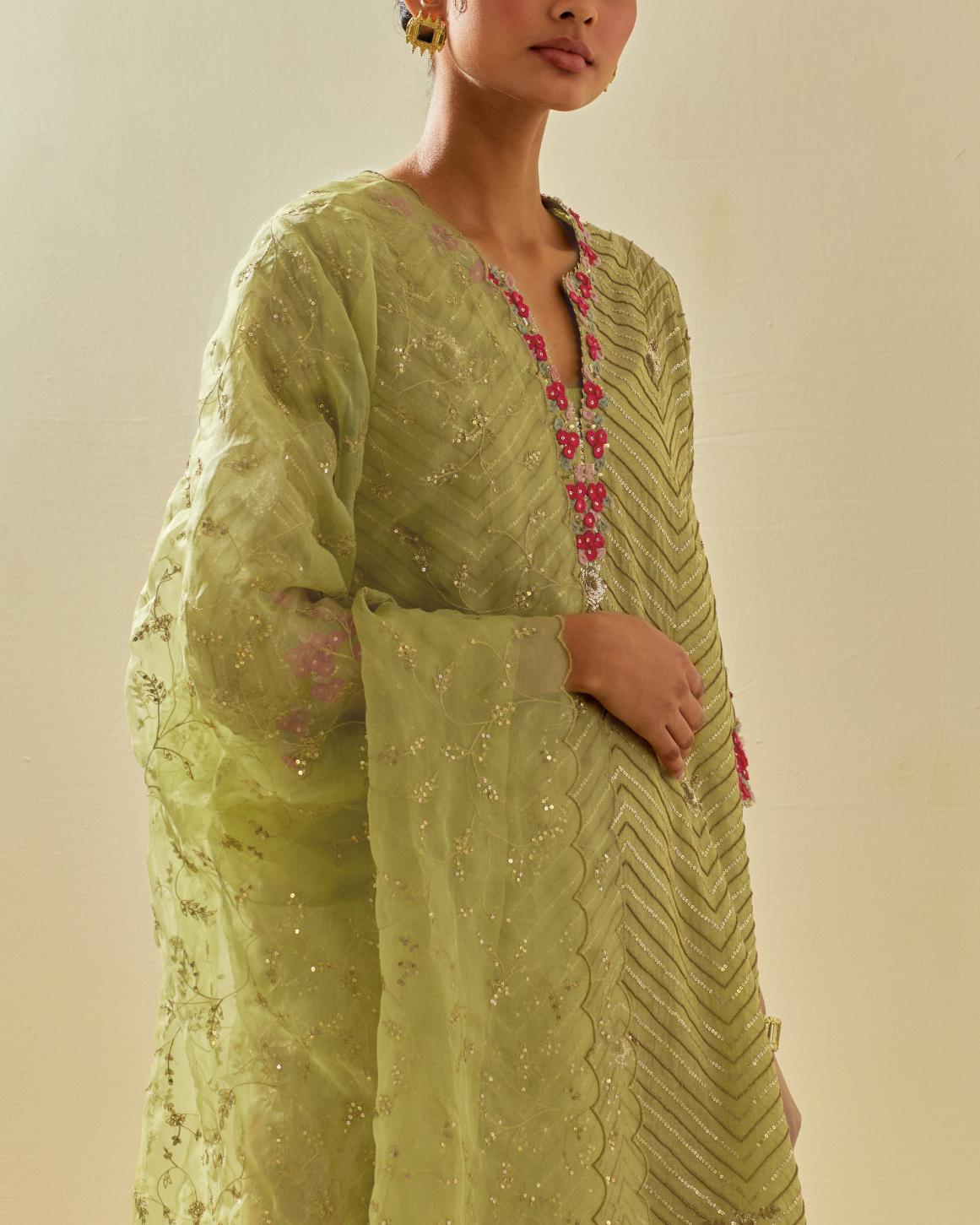 Green tissue chanderi easy fit short kurta set, highlighted with gold sequins and beads.