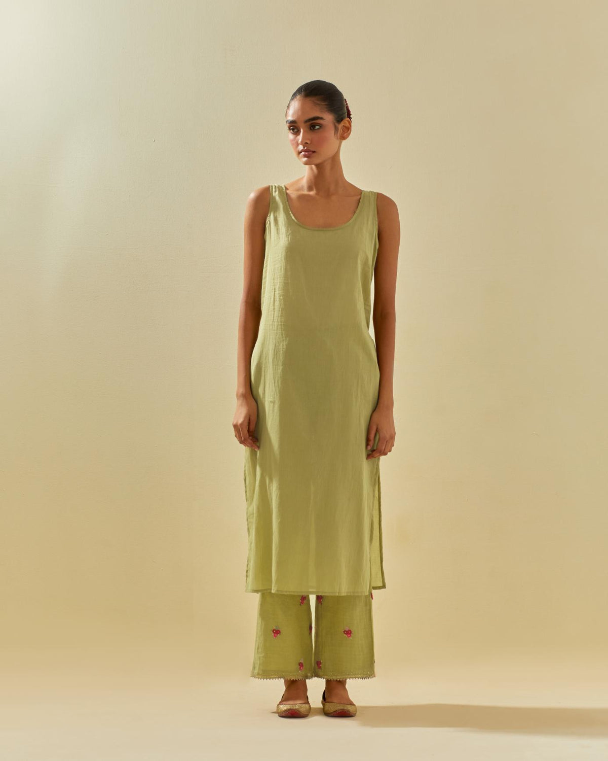 Green tissue chanderi hand cut silk flower embroidered kurta dress set with fine gathers at empire line.