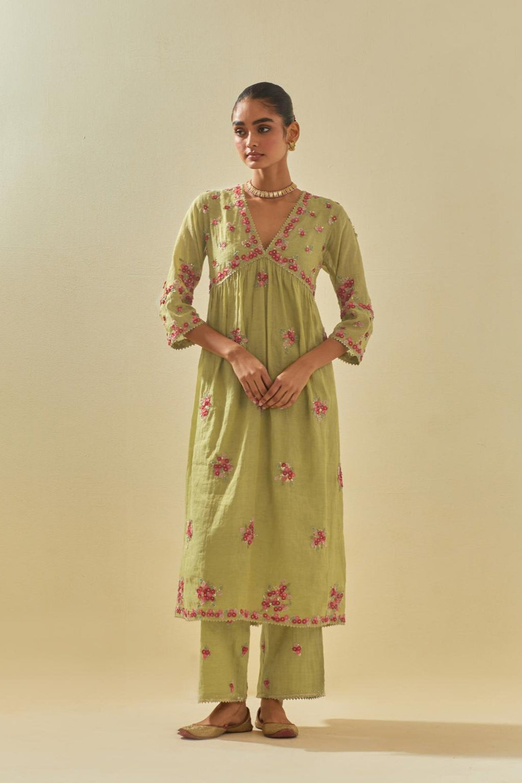 Green tissue chanderi hand cut silk flower embroidered kurta dress set with fine gathers at empire line.
