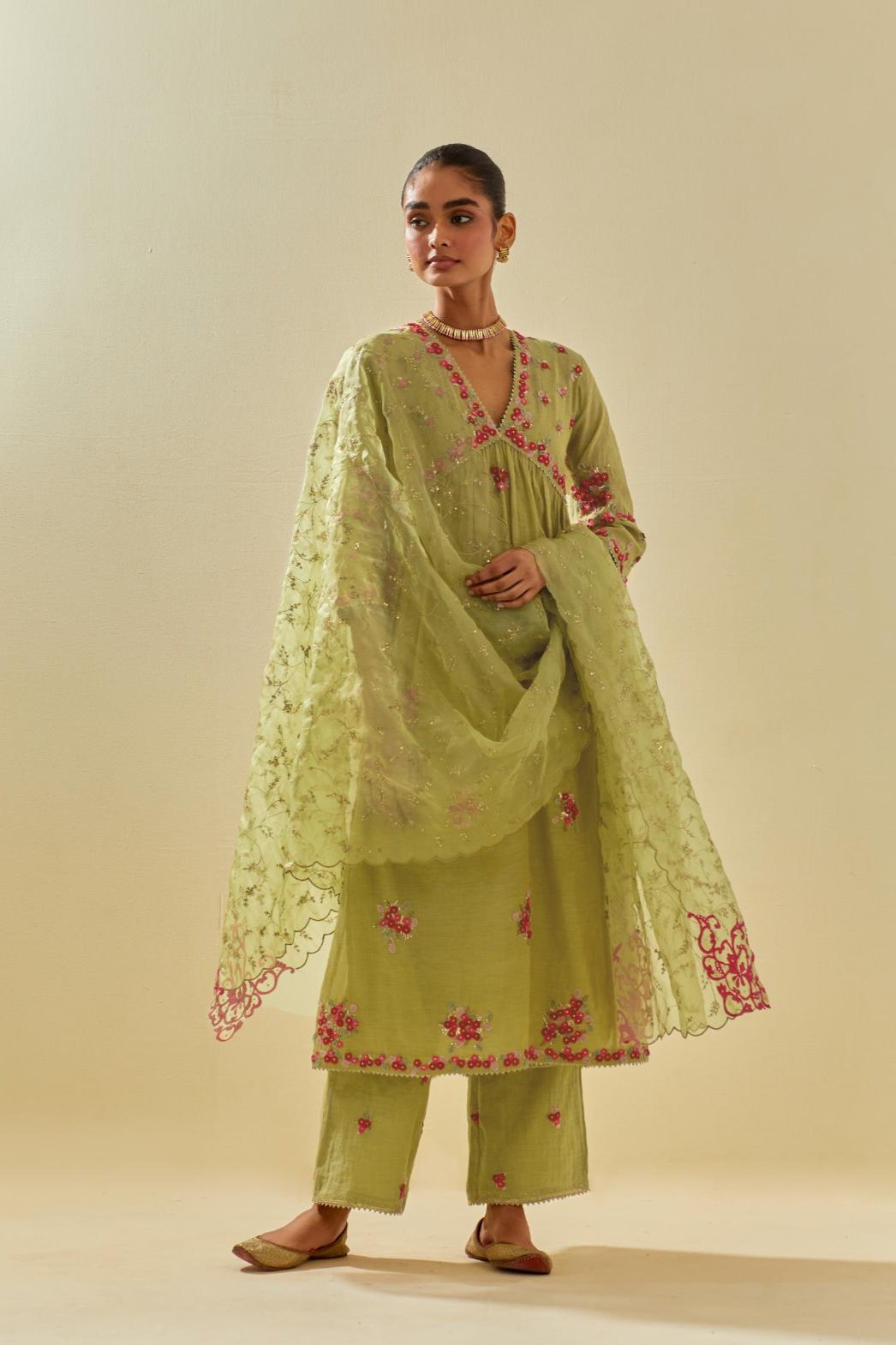 Green tissue chanderi hand cut silk flower embroidered kurta dress set with fine gathers at empire line.