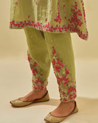 Green tissue chanderi mid length kalidar kurta set with hand cut silk flower embroidery, highlighted with gold sequins.