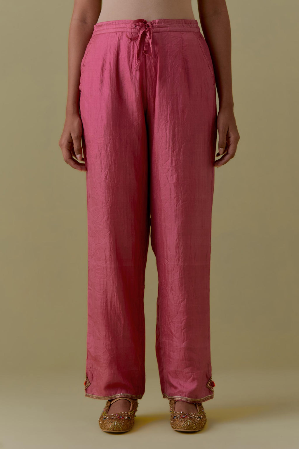 Pink Silk Hand-Block Printed Straight Pants with hand work at hem.