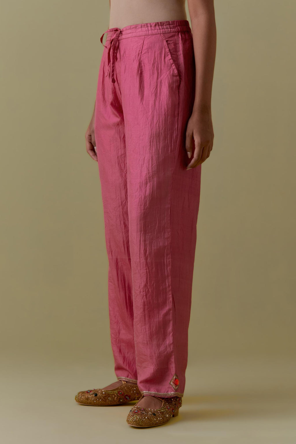 Pink Silk Hand-Block Printed Straight Pants with hand work at hem.
