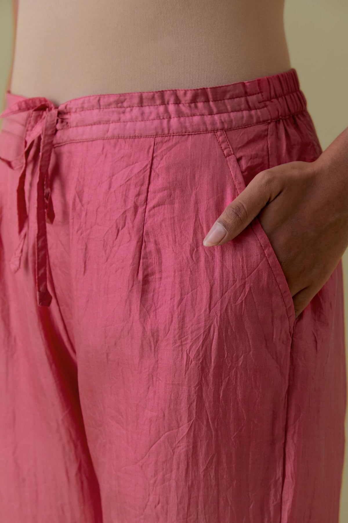 Pink Silk Hand-Block Printed Straight Pants with hand work at hem.
