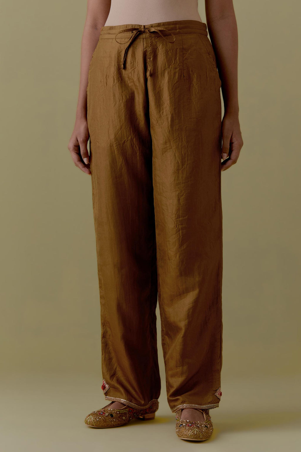 Olive Silk Hand-Block Printed Straight Pants with hand work at hem.