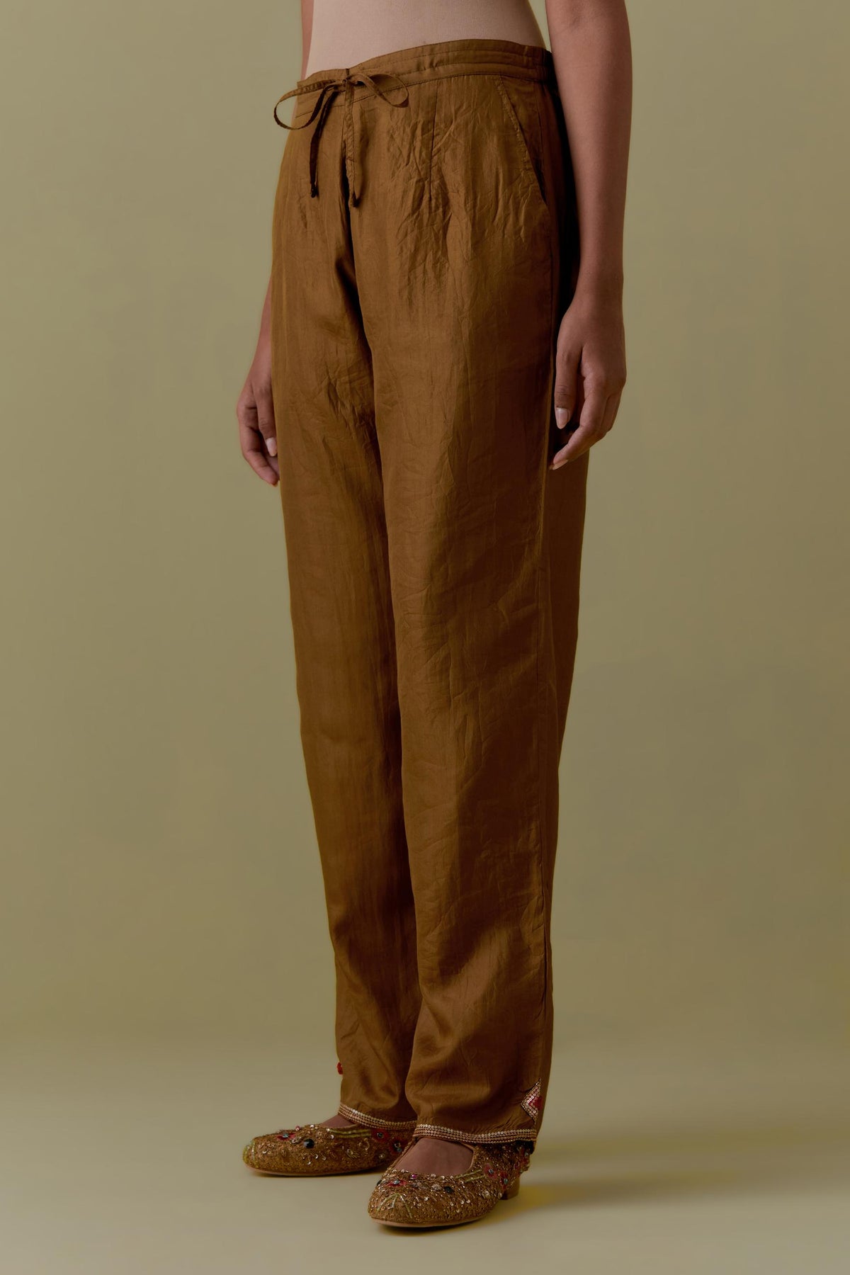 Olive Silk Hand-Block Printed Straight Pants with hand work at hem.