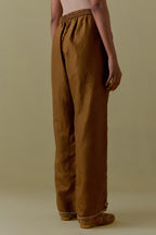Olive Silk Hand-Block Printed Straight Pants with hand work at hem.