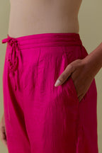 Fuchsia Silk Hand-Block Printed Straight Pants with hand work at hem.