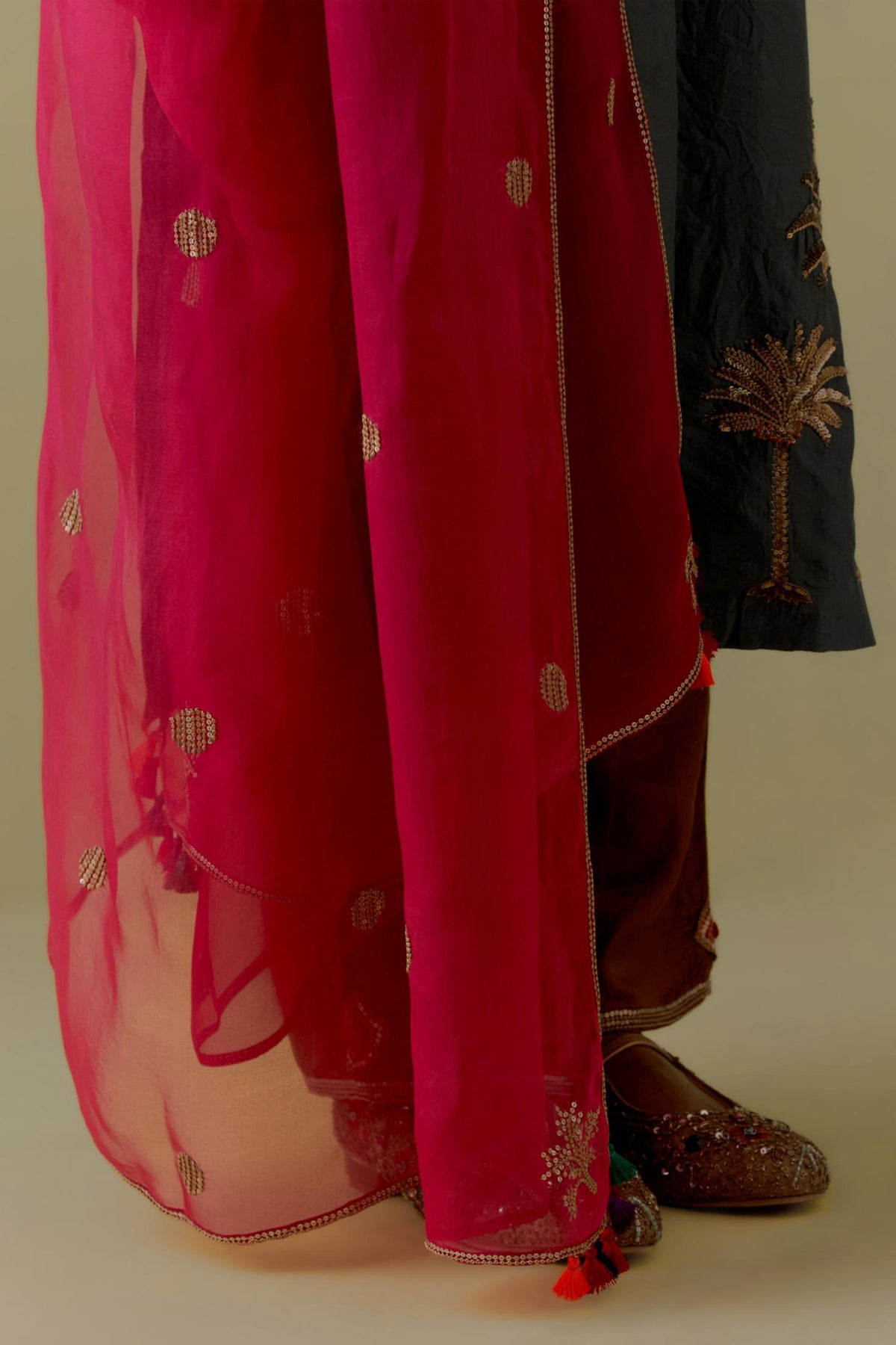 Green silk straight Kurta set with Hand-Worked Palm Motifs.