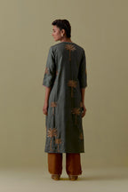 Green silk straight Kurta set with Hand-Worked Palm Motifs.