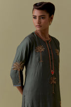Green silk straight Kurta set with Hand-Worked Palm Motifs.