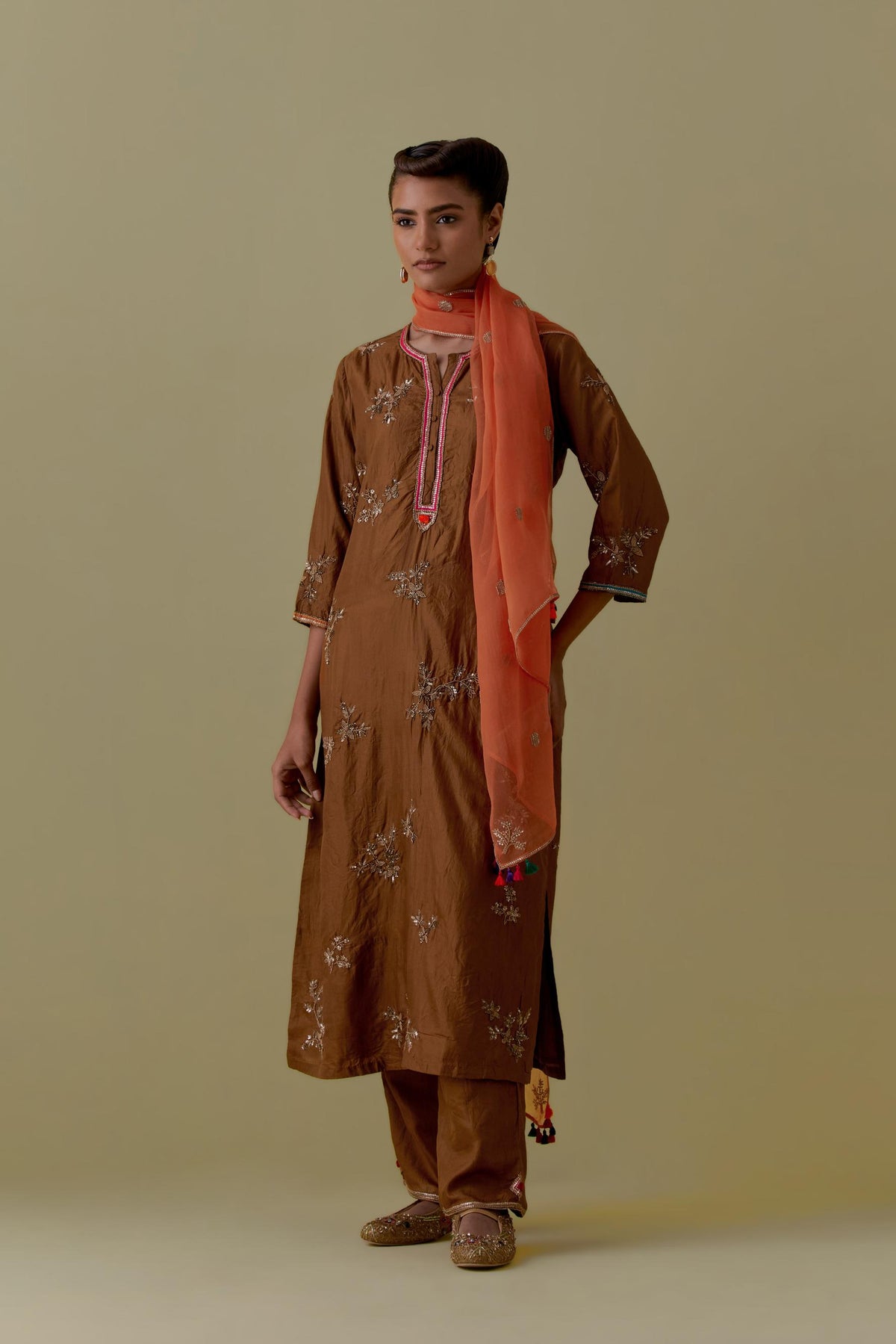Olive Silk Striaght Kurta set with Hand-Worked Floral Motifs.