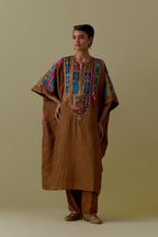 Olive Kaftan with Multicoloured Appliqué & Handwork. Paired with olive Silk Hand-Block Printed Straight Pants with hand work at hem.