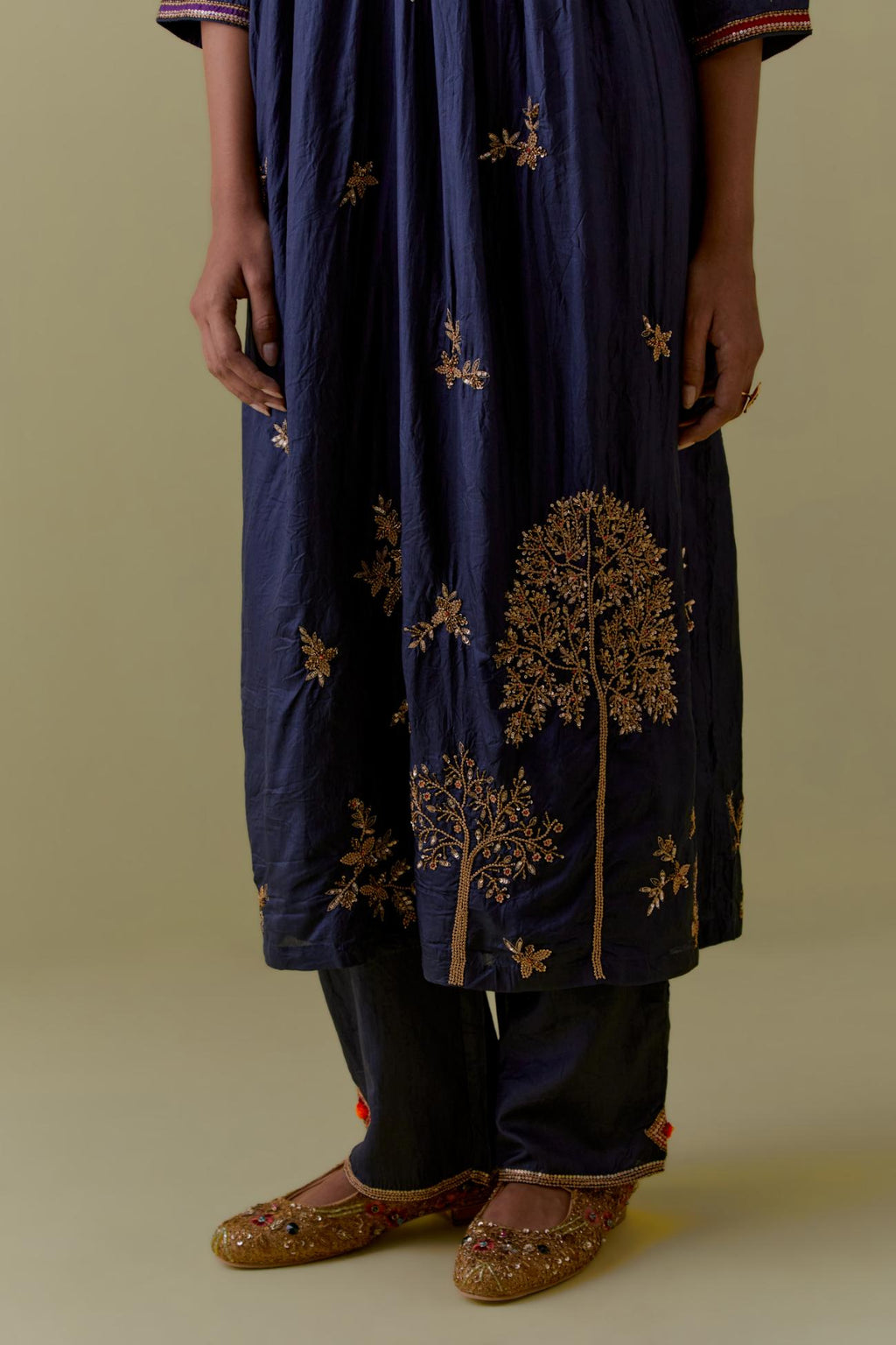 Indigo silk Kurta set with hand worked Floral & Tree Motifs.