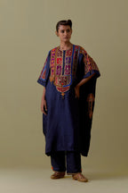 Indigo Kaftan with Multicoloured Appliqué & Handwork. Paired with Indigo Silk Hand-Block Printed Straight Pants with hand work at hem.