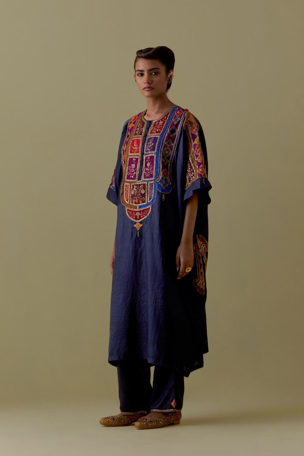 Indigo Kaftan with Multicoloured Appliqué & Handwork. Paired with Indigo Silk Hand-Block Printed Straight Pants with hand work at hem.