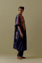 Indigo Kaftan with Multicoloured Appliqué & Handwork. Paired with Indigo Silk Hand-Block Printed Straight Pants with hand work at hem.