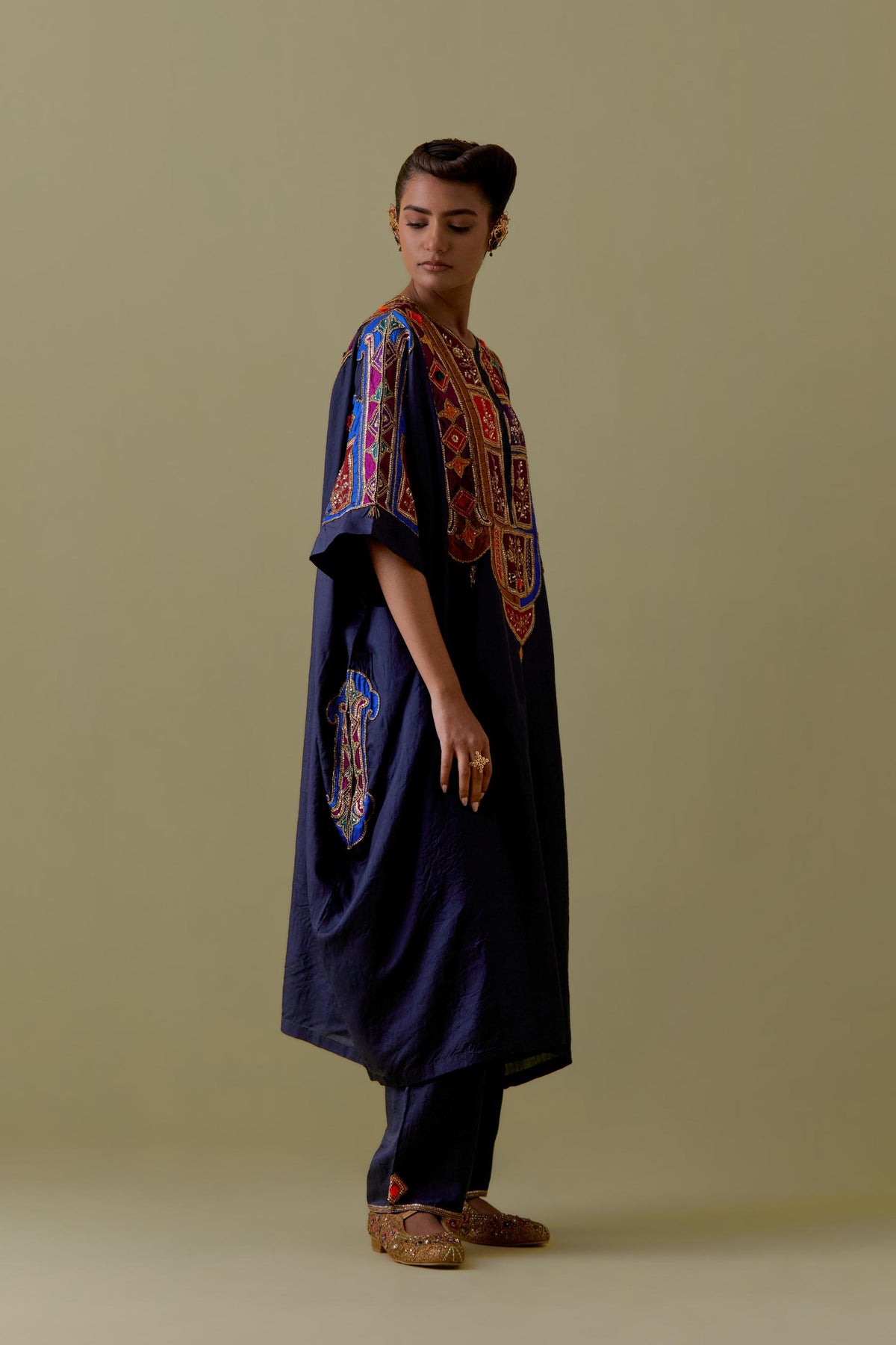 Indigo Kaftan with Multicoloured Appliqué & Handwork. Paired with Indigo Silk Hand-Block Printed Straight Pants with hand work at hem.