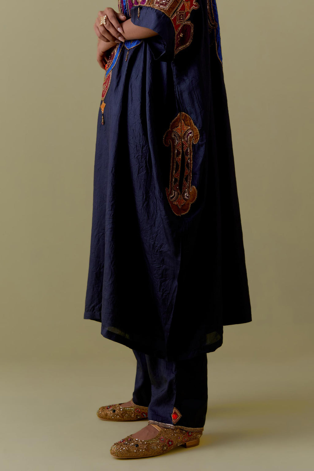 Indigo Kaftan with Multicoloured Appliqué & Handwork. Paired with Indigo Silk Hand-Block Printed Straight Pants with hand work at hem.