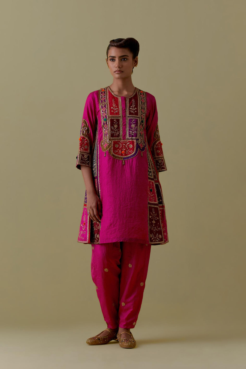 Fuchsia Silk Kalidar Kurta with Multicoloured Appliqué. Paired with fuchsia Silk Salwar with Gold seuins and bead Handwork