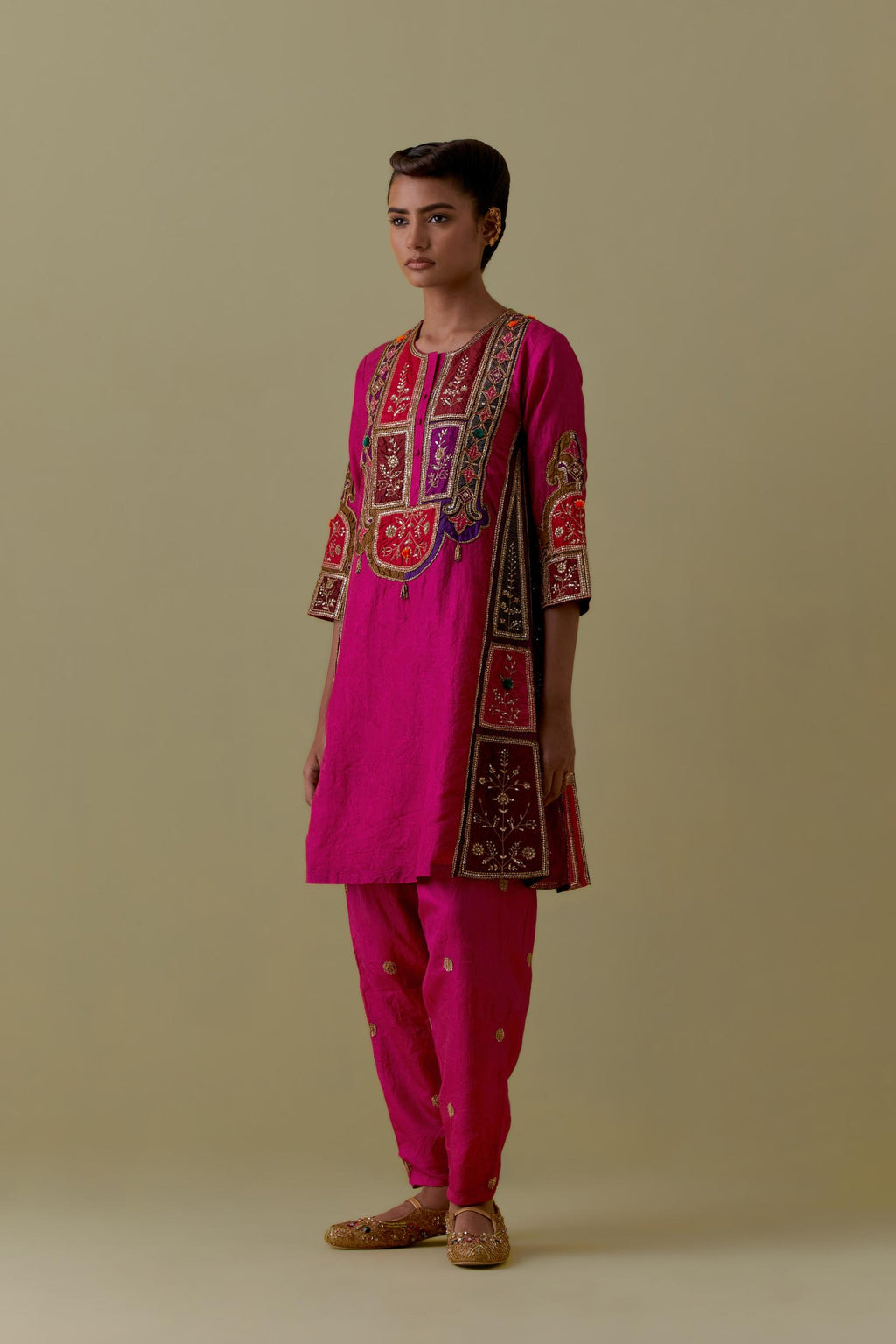 Fuchsia Silk Kalidar Kurta with Multicoloured Appliqué. Paired with fuchsia Silk Salwar with Gold seuins and bead Handwork