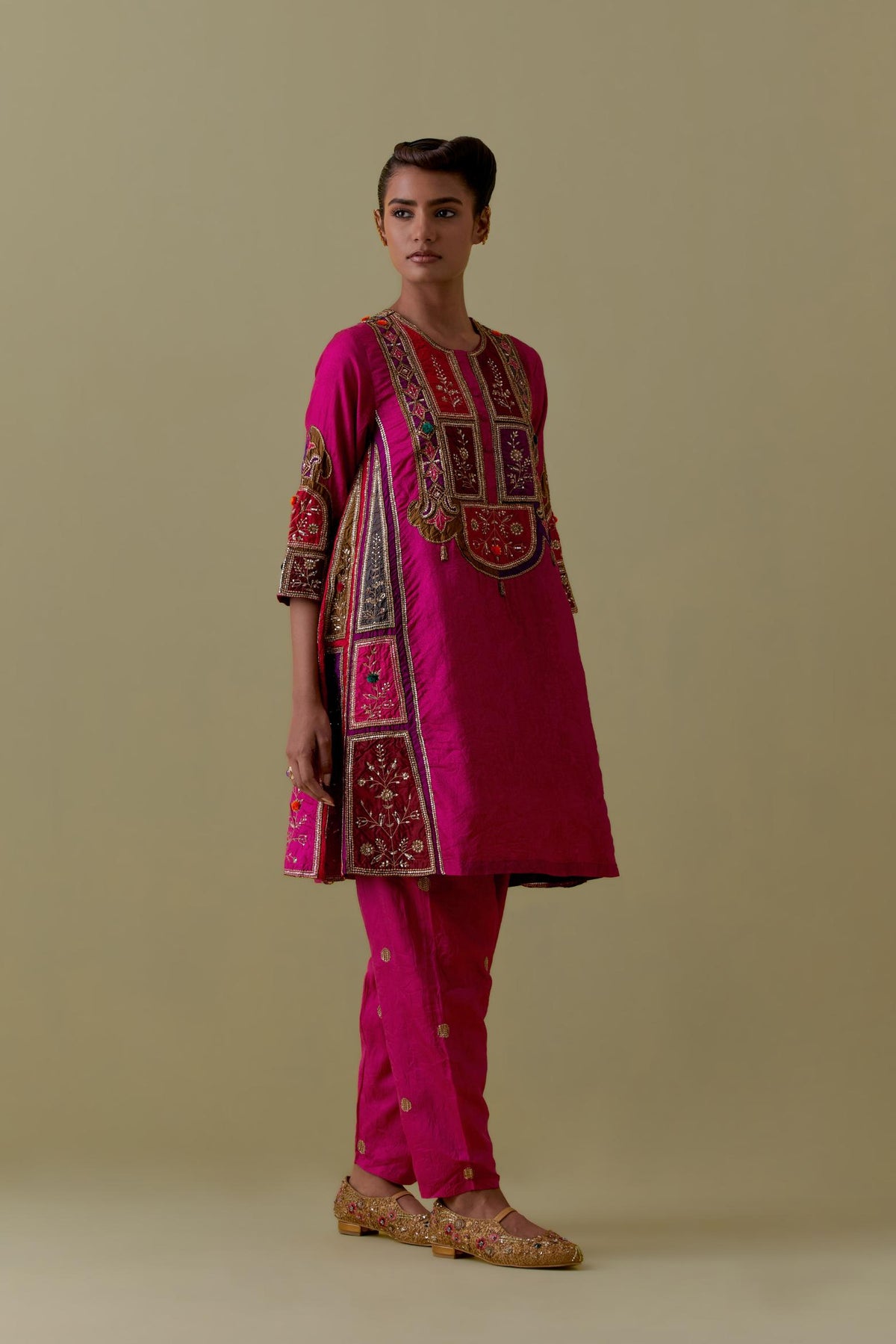 Fuchsia Silk Kalidar Kurta with Multicoloured Appliqué. Paired with fuchsia Silk Salwar with Gold seuins and bead Handwork