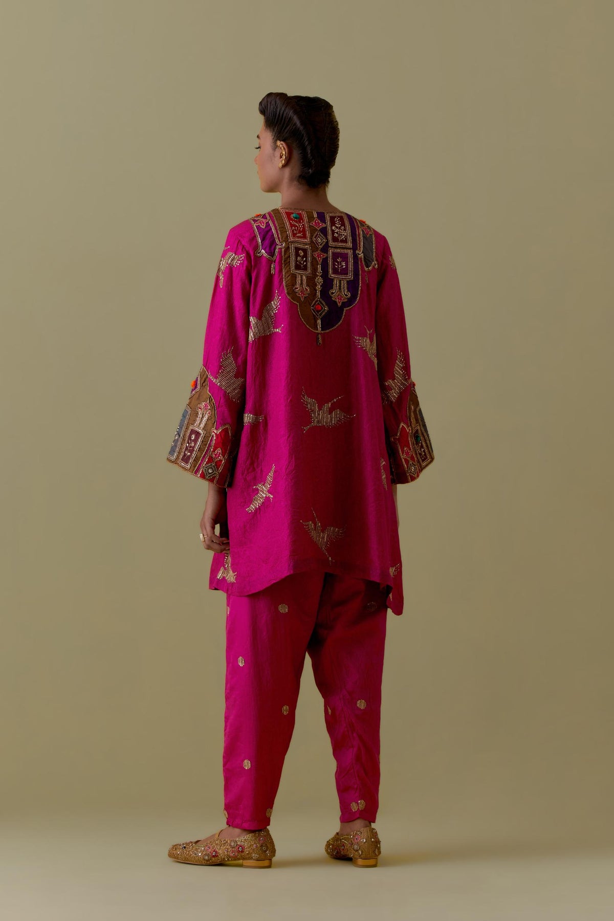 Fuchsia silk A-Line Kurta set with multicoloured appliqué & Hand-Worked Bird Motifs.