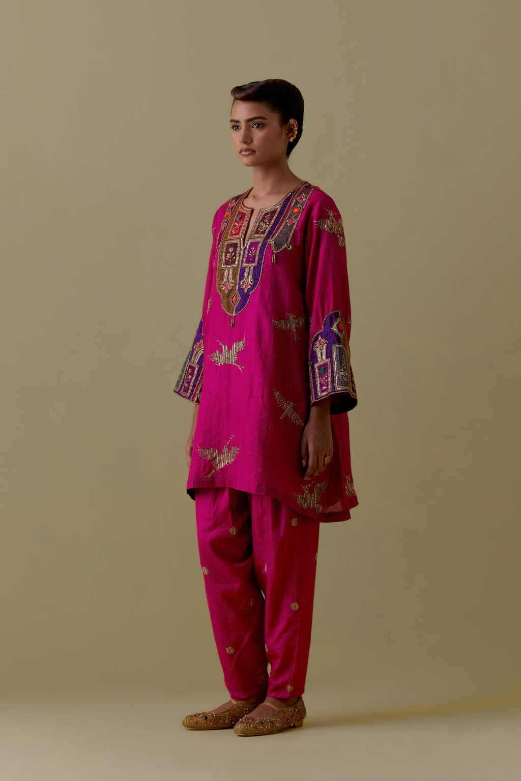 Fuchsia silk A-Line Kurta set with multicoloured appliqué & Hand-Worked Bird Motifs.