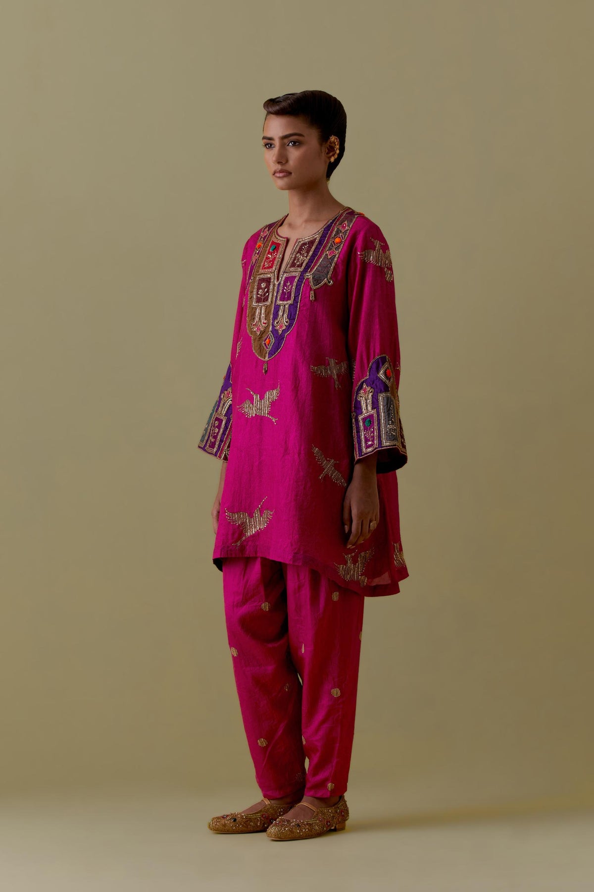 Fuchsia silk A-Line Kurta set with multicoloured appliqué & Hand-Worked Bird Motifs.