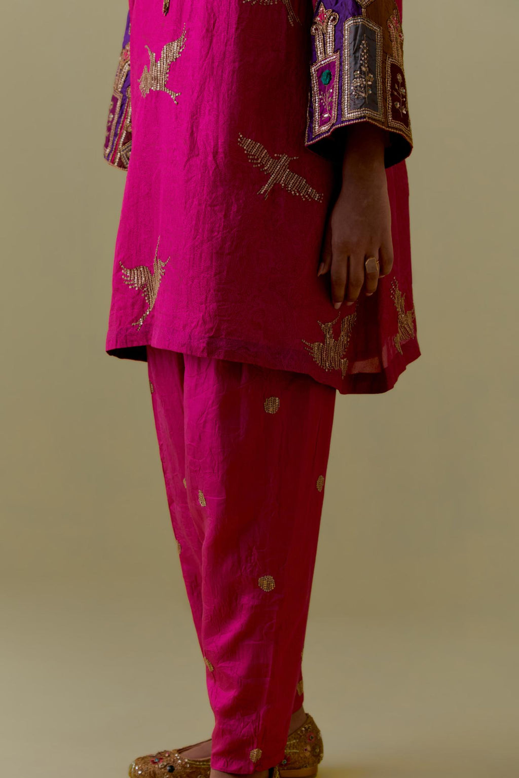 Fuchsia silk A-Line Kurta set with multicoloured appliqué & Hand-Worked Bird Motifs.