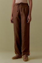 Chocolate Silk Hand-Block Printed Straight Pants with hand work at hem.