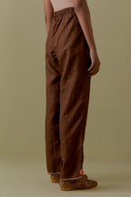 Chocolate Silk Hand-Block Printed Straight Pants with hand work at hem.