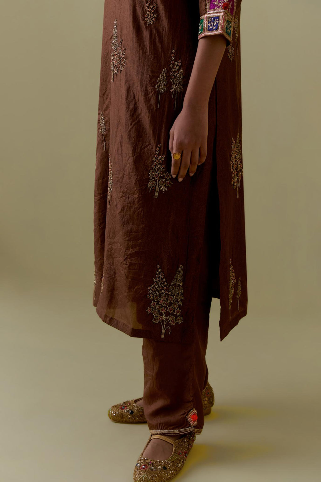 Chocolate silk straight Kurta set with Multicoloured Appliqué & Floral Motifs.