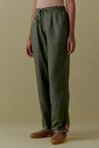 Green Silk Hand-Block Printed Straight Pants with hand work at hem.