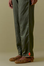 Green Silk Hand-Block Printed Straight Pants with hand work at hem.