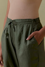 Green Silk Hand-Block Printed Straight Pants with hand work at hem.