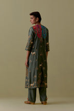 Green silk striaght Kurta set with Multicoloured Appliqué & Deer Motifs.
