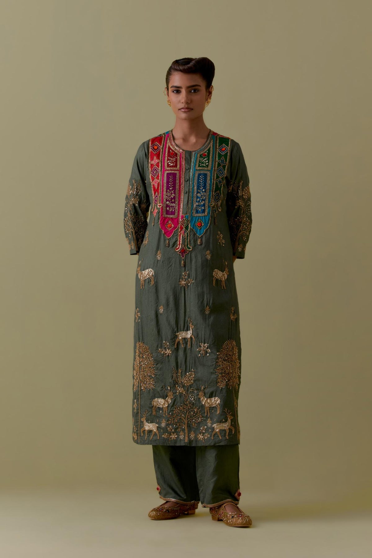 Green silk striaght Kurta set with Multicoloured Appliqué & Deer Motifs.