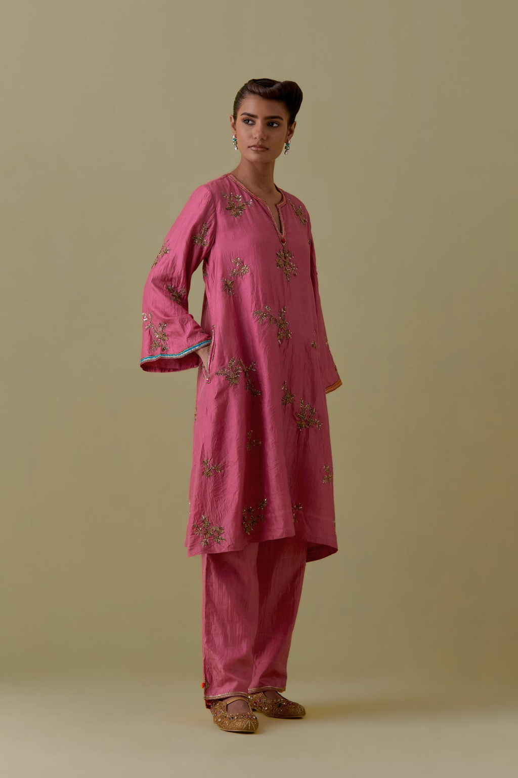 Pink A-Line short silk Kurta set with Hand-Worked Floral Motifs.