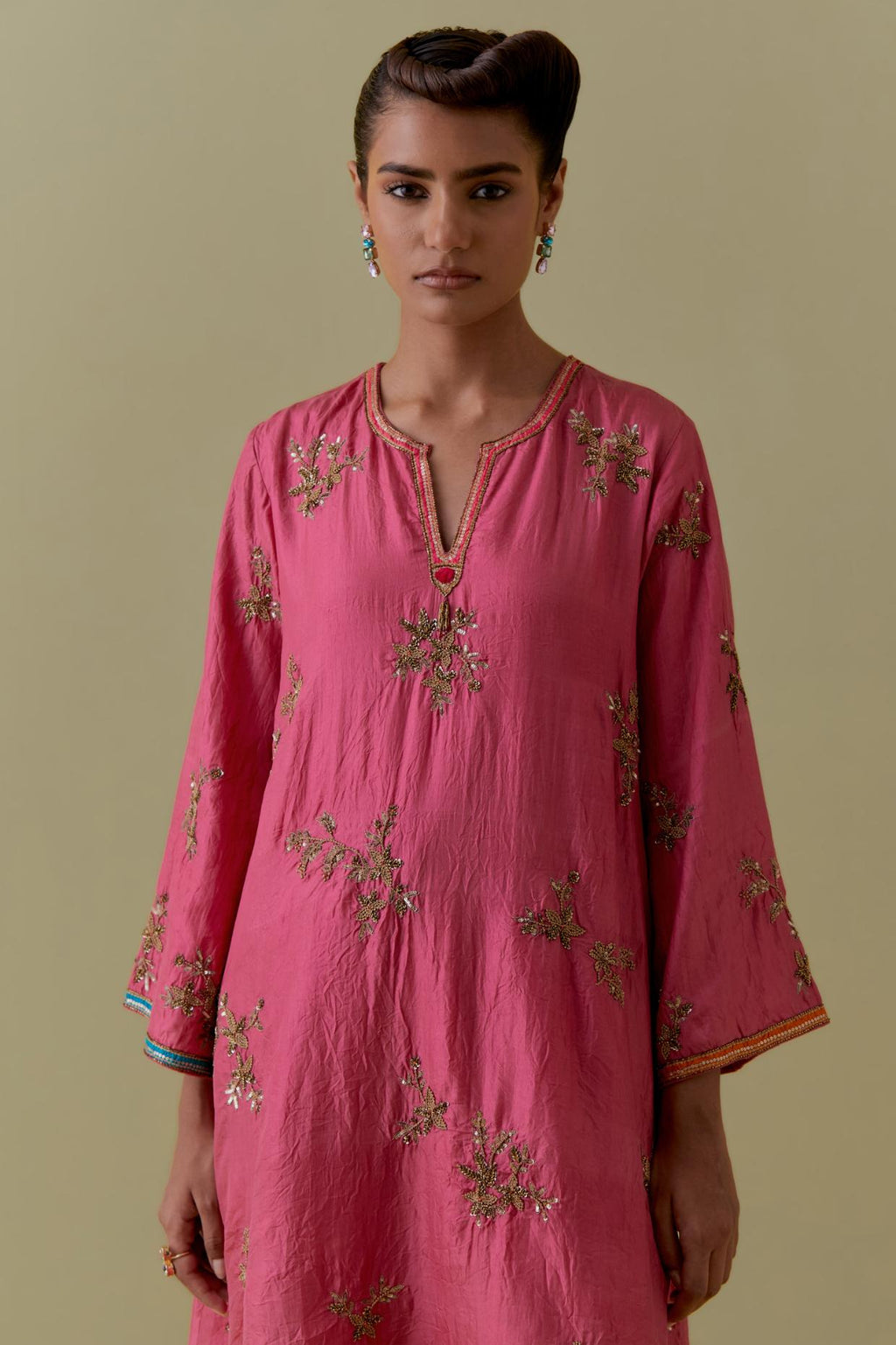 Pink A-Line short silk Kurta set with Hand-Worked Floral Motifs.