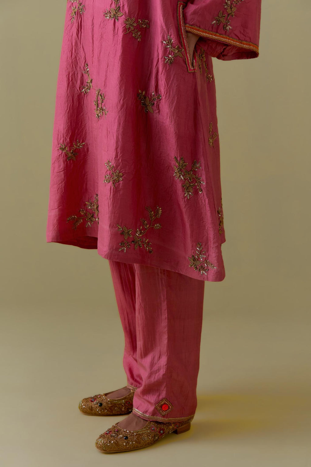 Pink A-Line short silk Kurta set with Hand-Worked Floral Motifs.