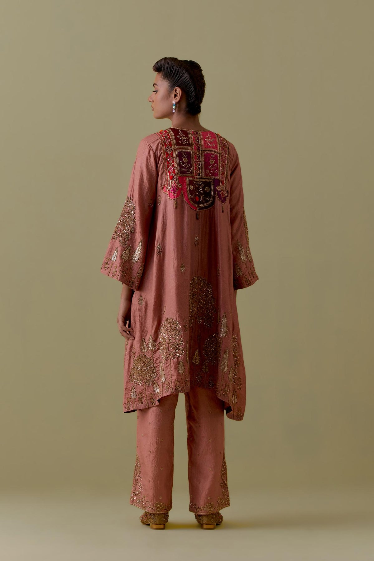 Peach A-Line silk short Kurta set with Multicoloured Appliqué & Gold Handwork.