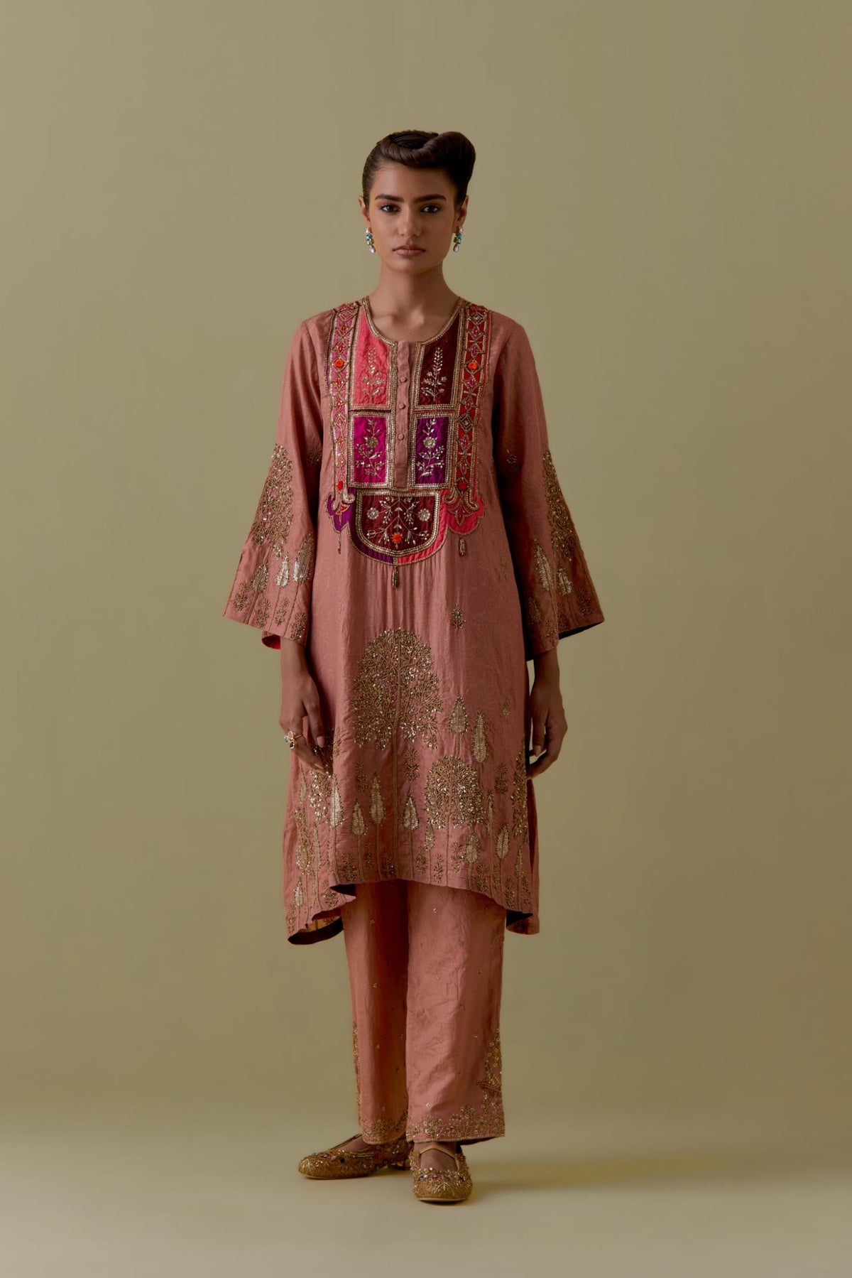 Peach A-Line silk short Kurta set with Multicoloured Appliqué & Gold Handwork.