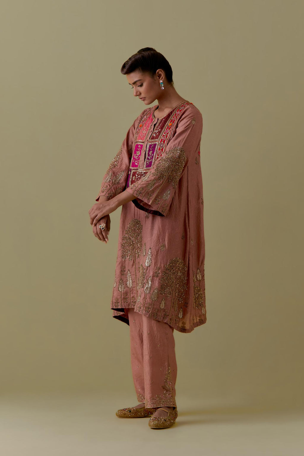 Peach A-Line silk short Kurta set with Multicoloured Appliqué & Gold Handwork.