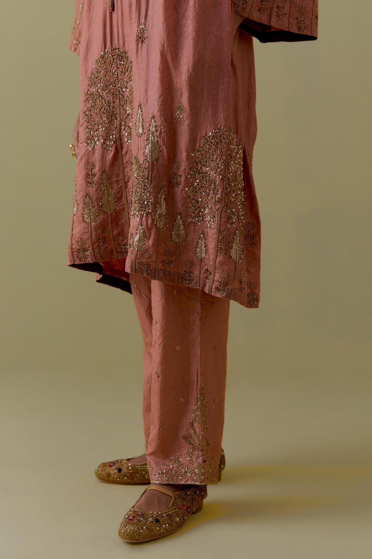 Peach A-Line silk short Kurta set with Multicoloured Appliqué & Gold Handwork.