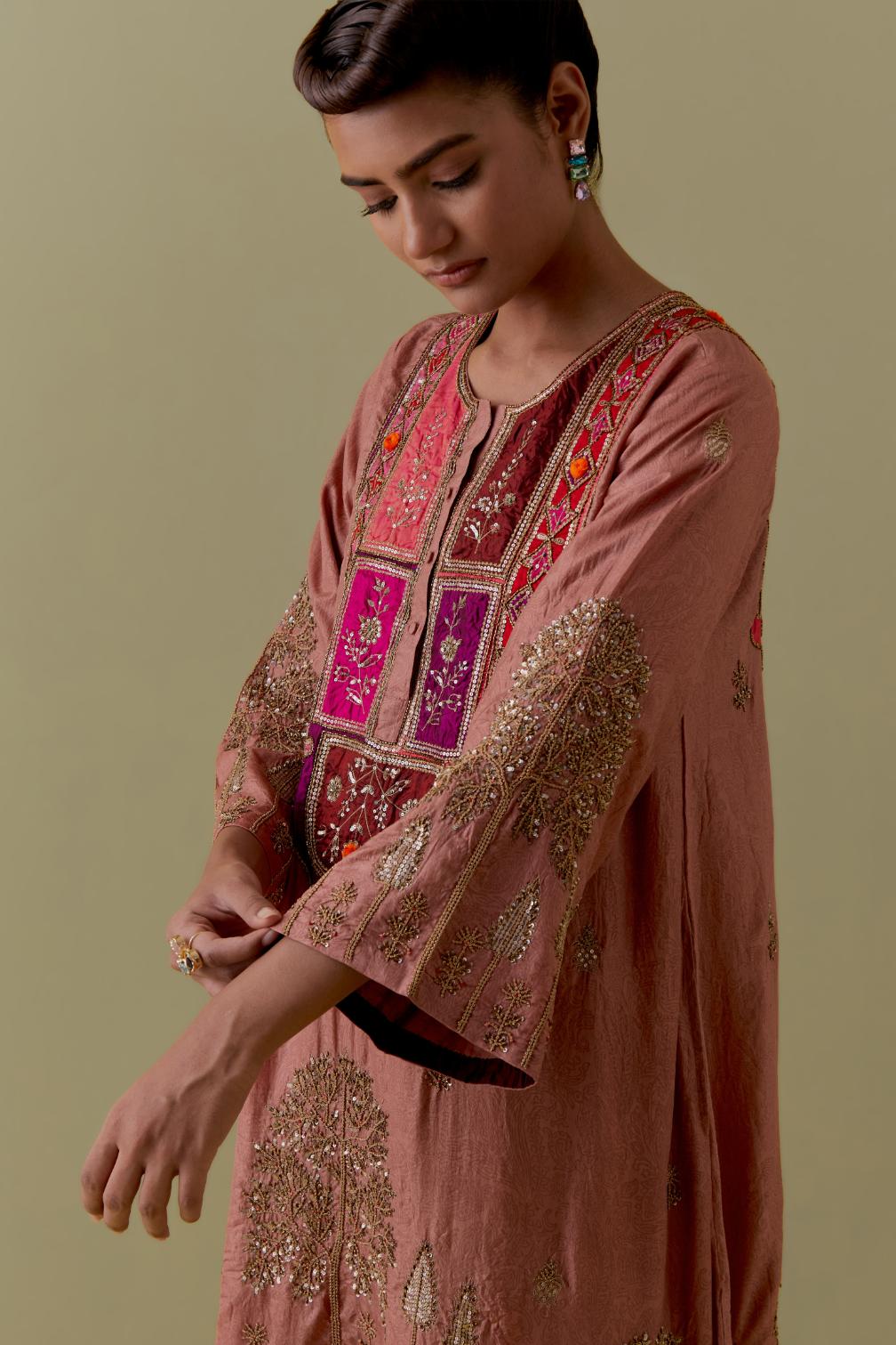 Peach A-Line silk short Kurta set with Multicoloured Appliqué & Gold Handwork.