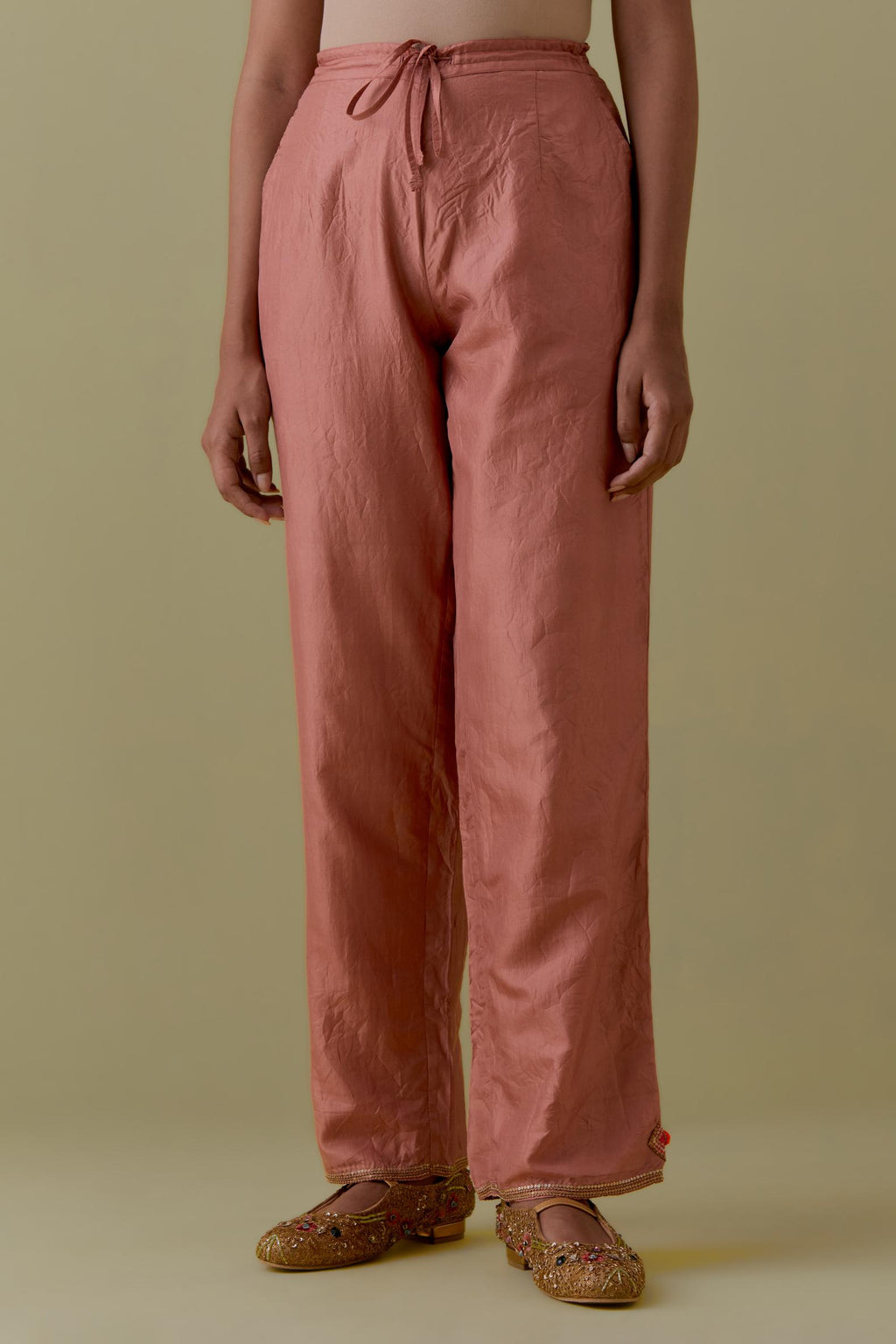 Peach Silk Hand-Block Printed Straight Pants with hand work at hem.
