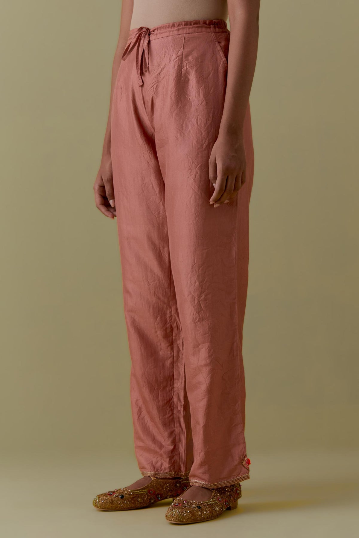 Peach Silk Hand-Block Printed Straight Pants with hand work at hem.