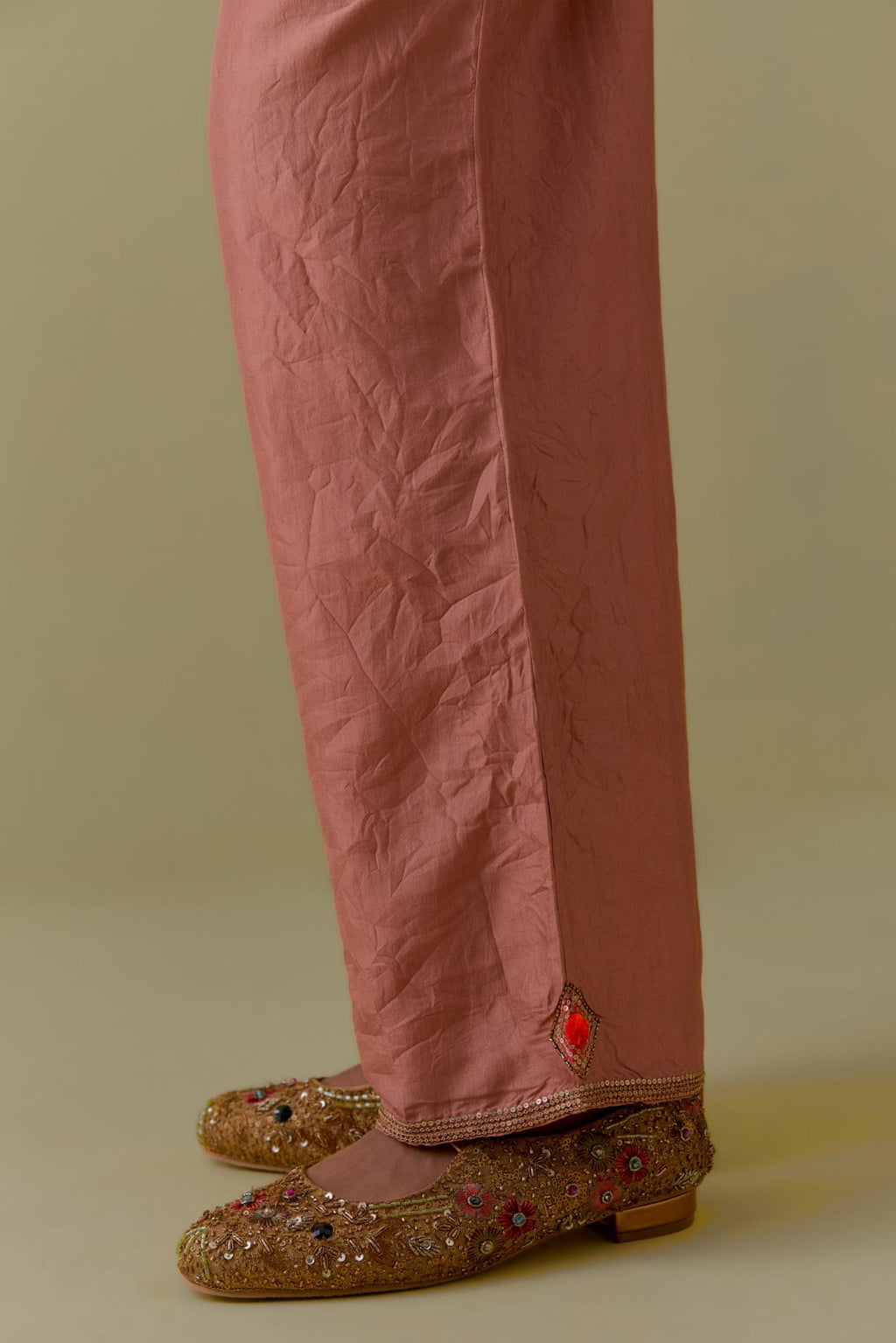 Peach Silk Hand-Block Printed Straight Pants with hand work at hem.