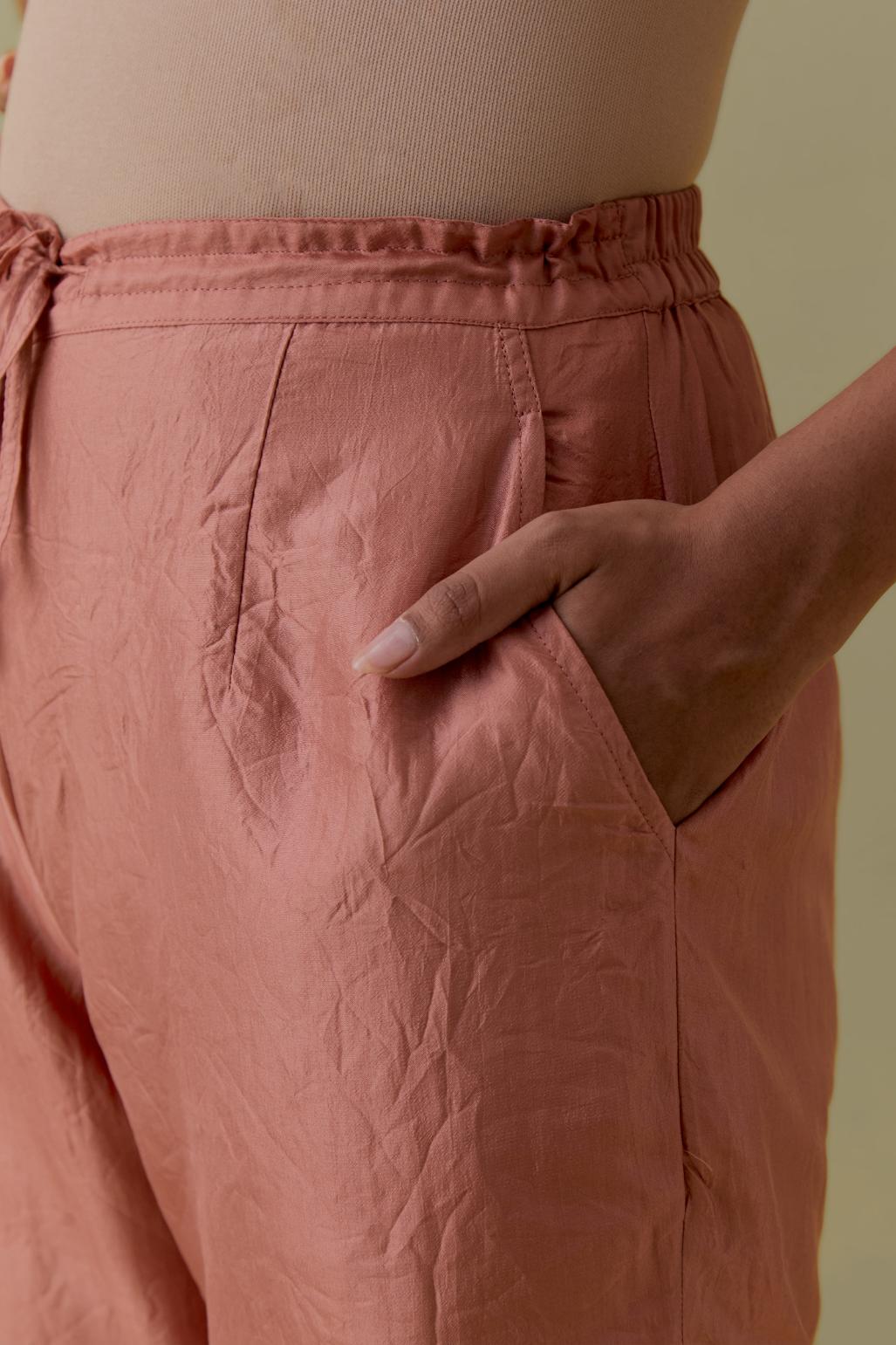 Peach Silk Hand-Block Printed Straight Pants with hand work at hem.